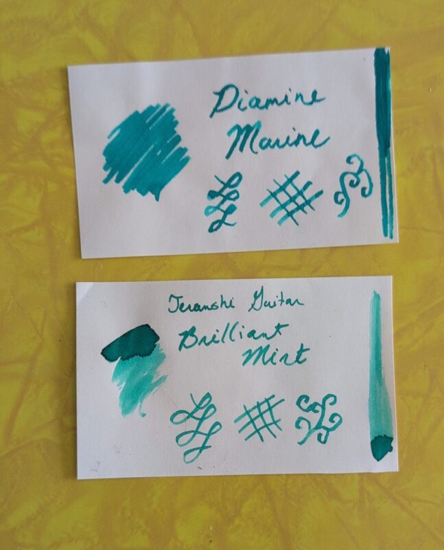 Two similar swatch cards: the top one is Diamine Marine, a light teal ink that leans a bit blue, and the bottom is Teranishi Guitar Brilliant Mint, a very similar ink that leans a bit more green (or mint).